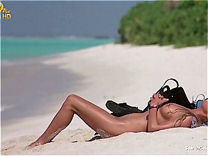 splendid Bo Derek showing off her furry cunt at the beach