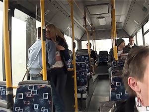 Lindsey Olsen plows her fellow on a public bus